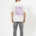 Love Never Fails Cotton Tee