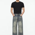 Distressed Denim Jeans